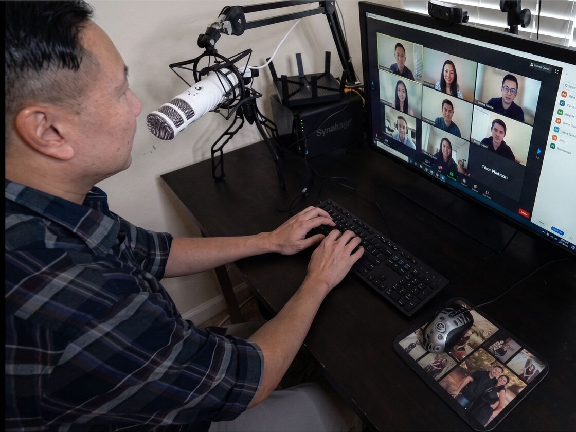 Steve running a live office hours session, with students on screen in a video call